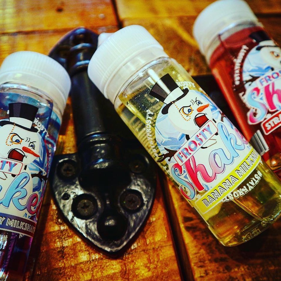 e-cigarettes and a bottle of e-liquid